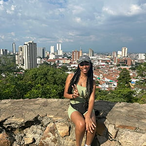 student sitting on ledge