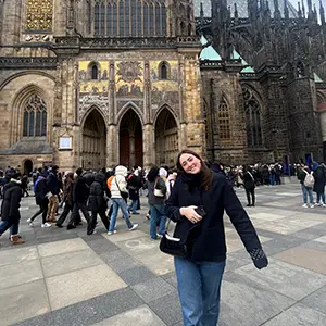 student standing on street in Prague