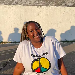 woman sitting smiling during golden hour