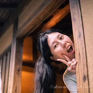 student looking through window