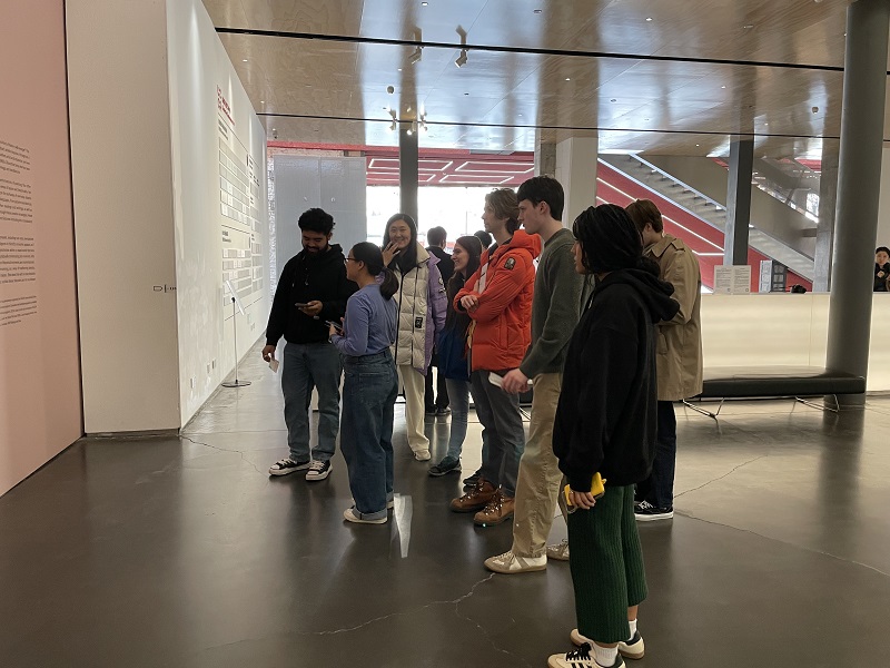 Student looking at a wall within the Beijing’s 798 Art District