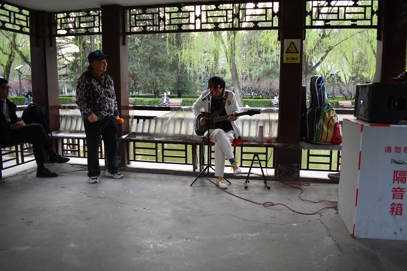 A band playing in a park pavilion in Beijing, China