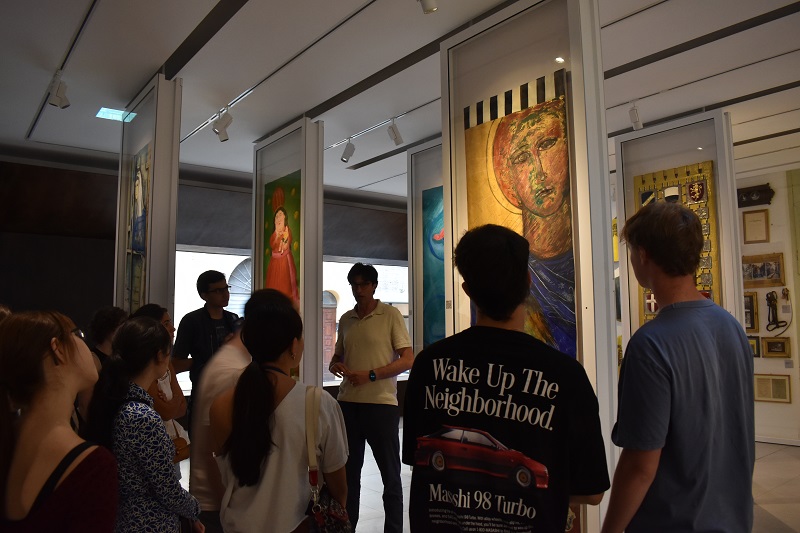 CET Siena students listening to someone talk at the Contrada Museum