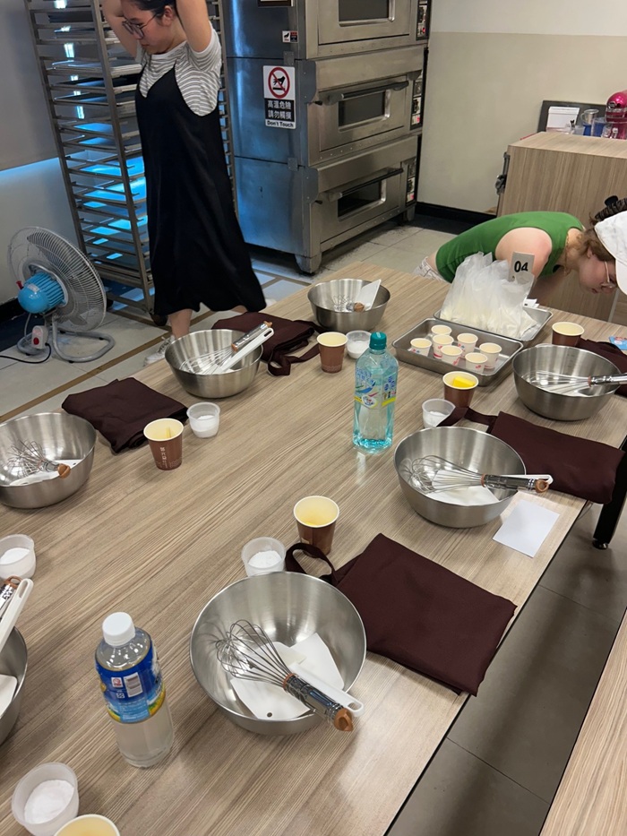 A table set up with ingredients to make pineapple cakes