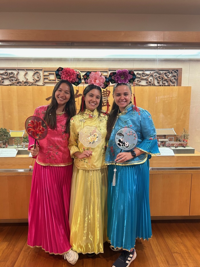 Three CET Taiwan students wearing traditional Taiwanese clothing