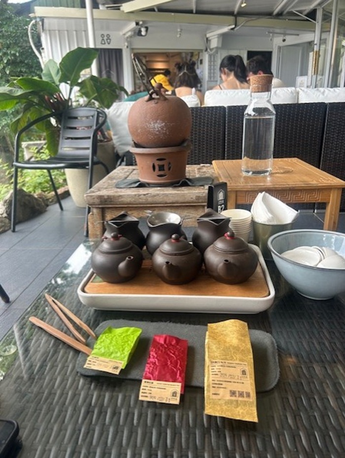 A set of tea cups and bags on a table
