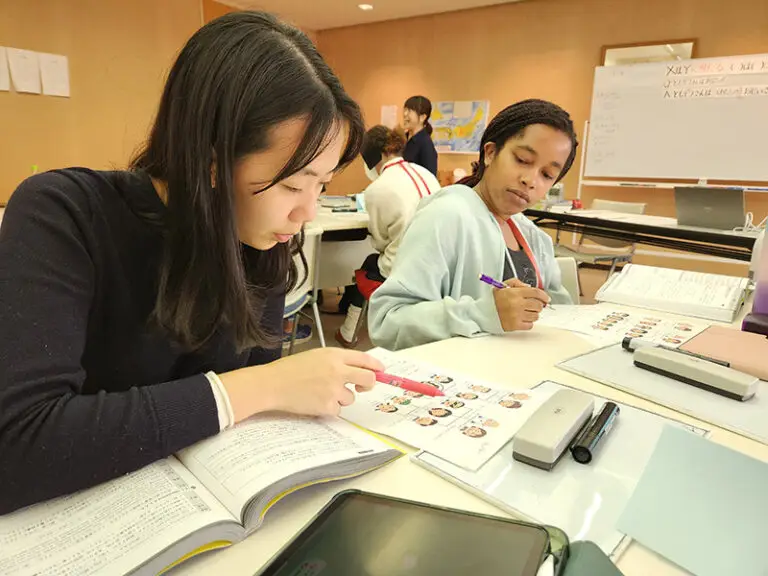 students reading textbook