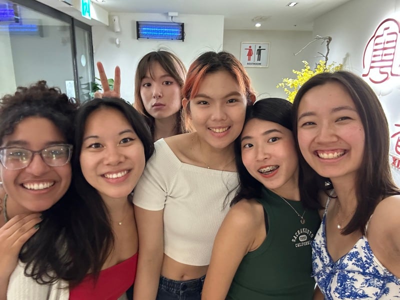 A group selfie of five girls, CET Taiwan students and local roommates