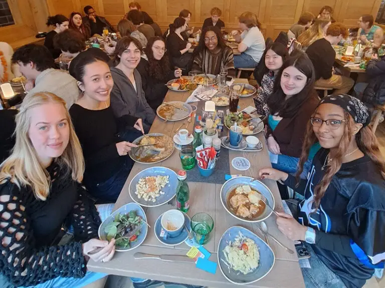 group of students eating at table