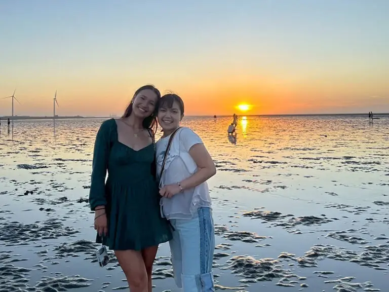 students at sunset in beach