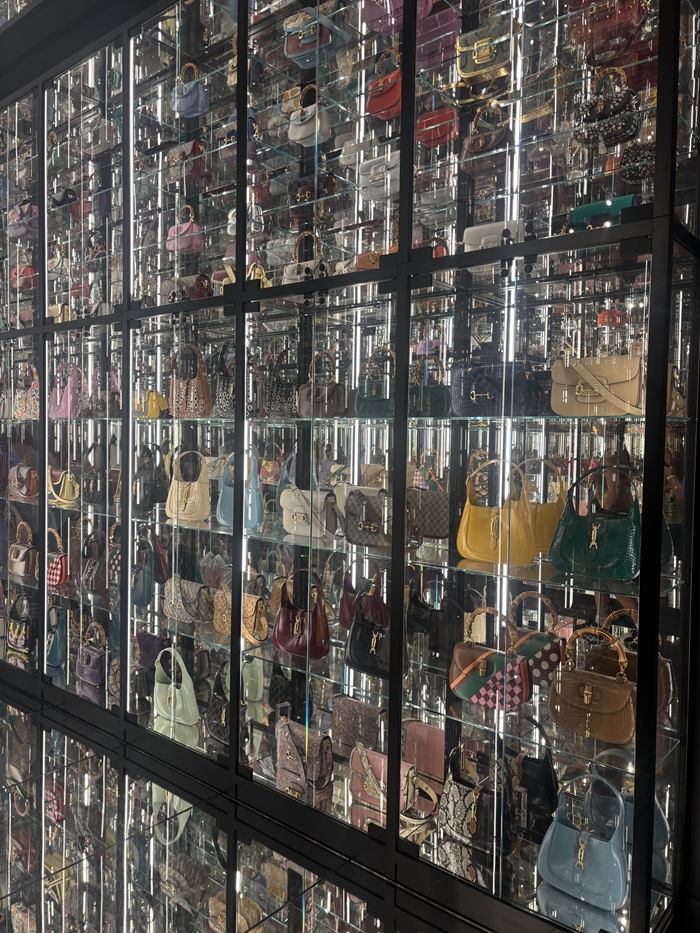 Many purses on display within the Gucci Museum