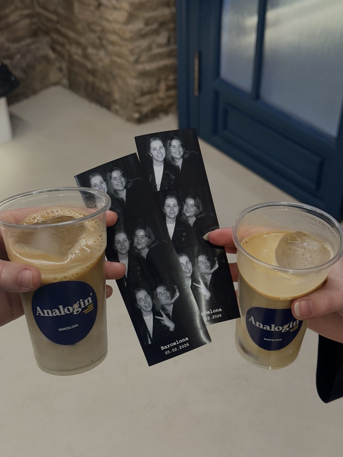 Two photo strips from a photobooth  of two CET Barcelona students with hands holding a little cup of iced coffees too
