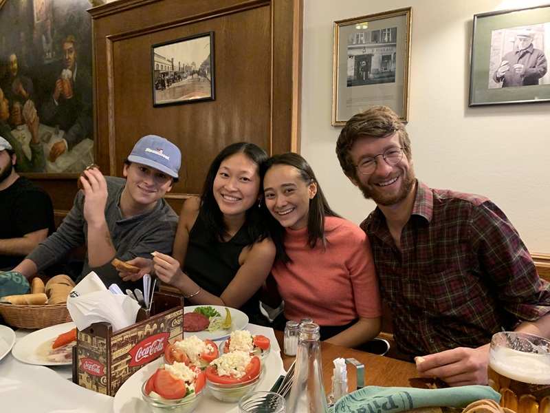 A group of CET Prague enjoying a meal together inside of a restaurant