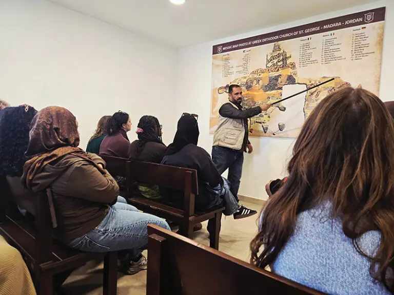 students in classroom listening to professor