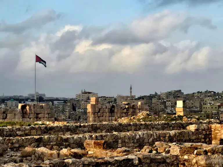 view of Amman with the Jordan flag