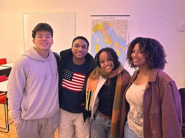 students smiling at camera
